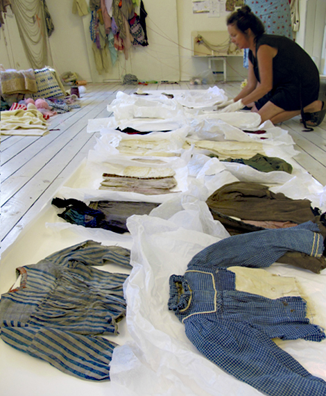 Kari Steilhaug working on the old textiles